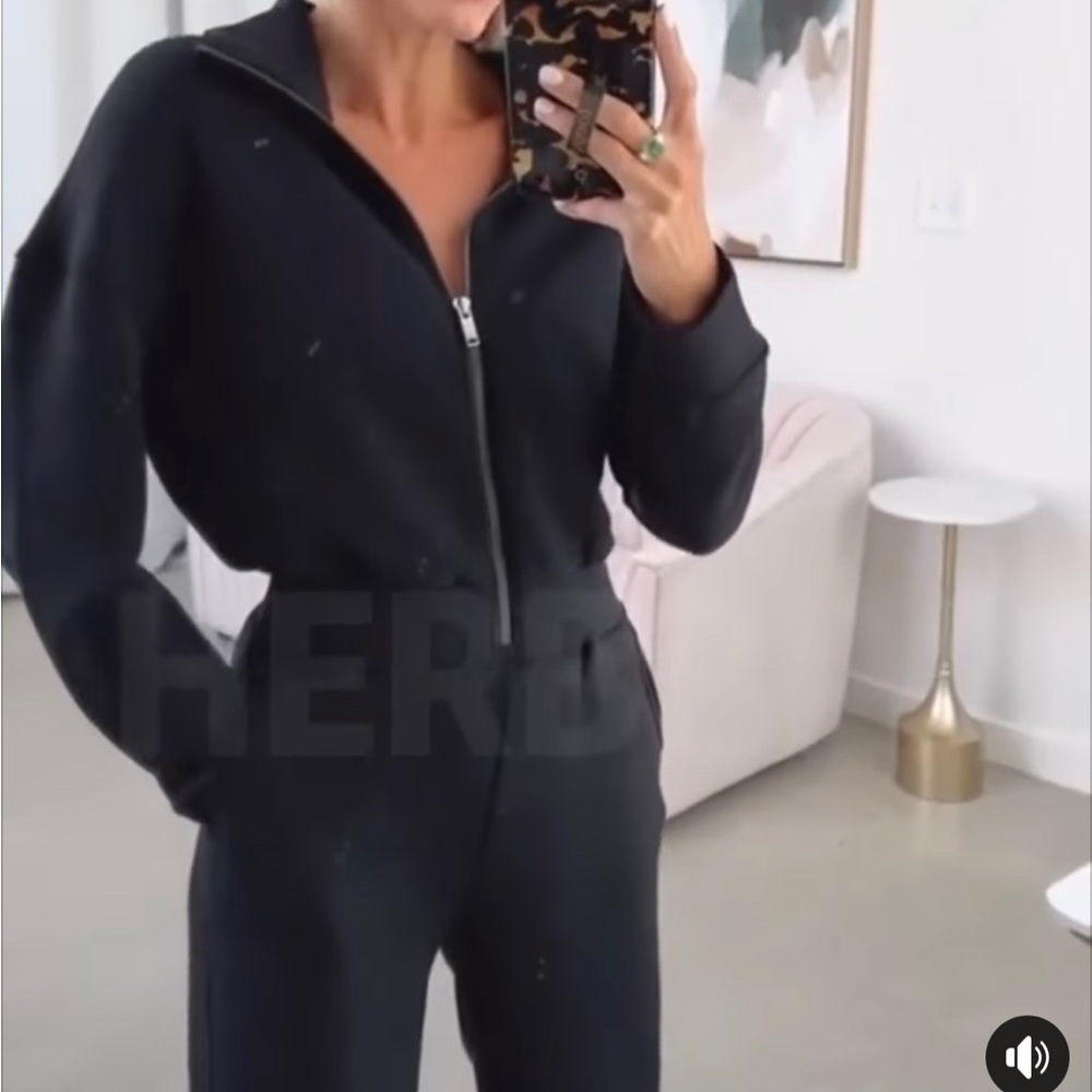 NWOT One Piece Black Jumper size Small